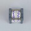 The NC-2 number counter viewed from the top to show the two dials. The version shown has a dark gray base and a pink heart in the middle on both sides 1 and 2.