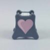 The NC-3 number counter viewed from the left side 1 to show the castle image. The version shown has a dark gray base and a pink heart in the middle on both sides 1 and 2.