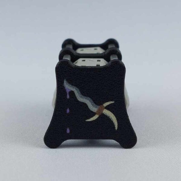 The CC-2x2 creature counter viewed from the left "power" side 1 to show the necromancer dagger image. This version shown is black with necro dagger and soul potion.