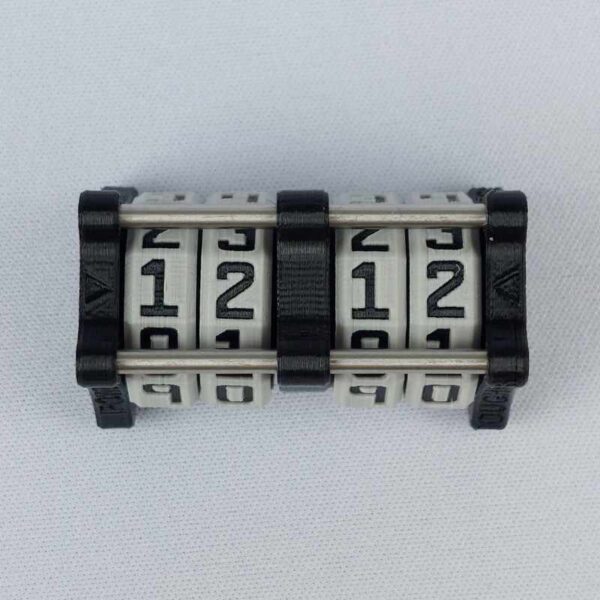The CC-2x2 creature counter viewed from the top to show the four dials with divider. This version shown is black with necro dagger and soul potion.
