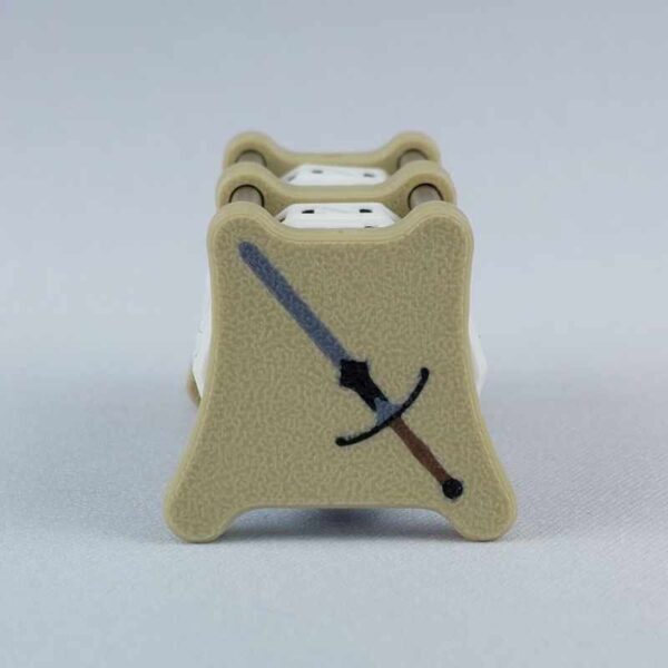 The CC-2x2 creature counter viewed from the left "power" side 1 to show the great sword image. This version shown is ivory white with great sword and sun shield.