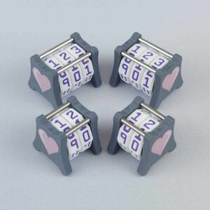 Two NC-2 and two NC-3 number counters grouped together to show the different size options and to show both side 1 and side 2 image designs in one photo. The version shown has a dark gray base and a pink heart in the middle on both sides 1 and 2.