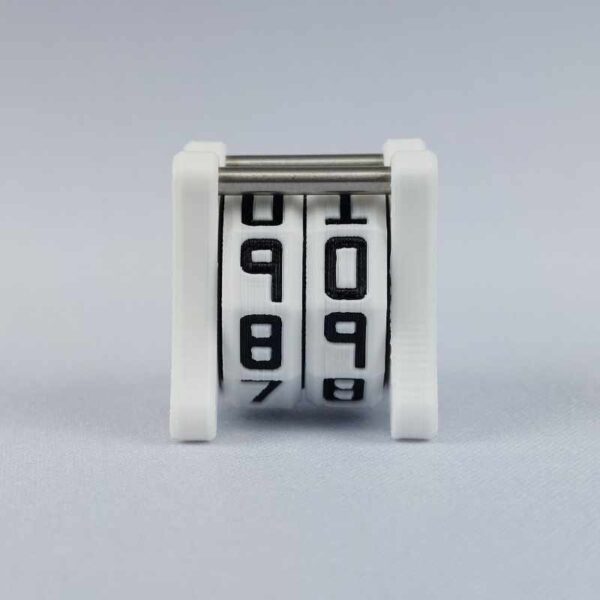 The NC-2 number counter viewed from the front. The version shown has a white base with a black castle outline in the middle on both sides 1 and 2.