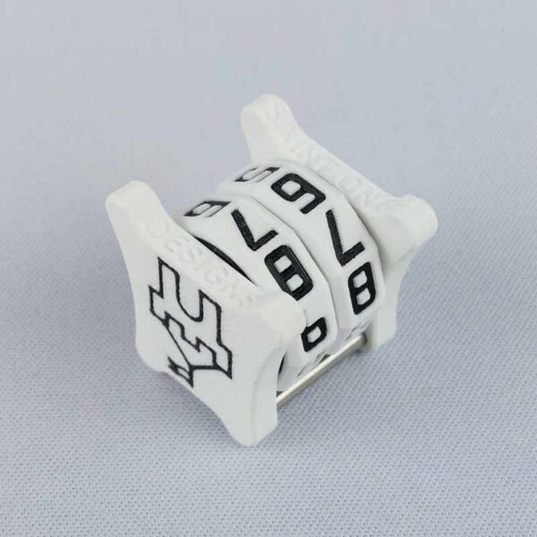 The NC-2 number counter viewed from an isometric angle showing the bottom and side 2 potted agave. The version shown has a white base with a black castle outline in the middle on both sides 1 and 2.