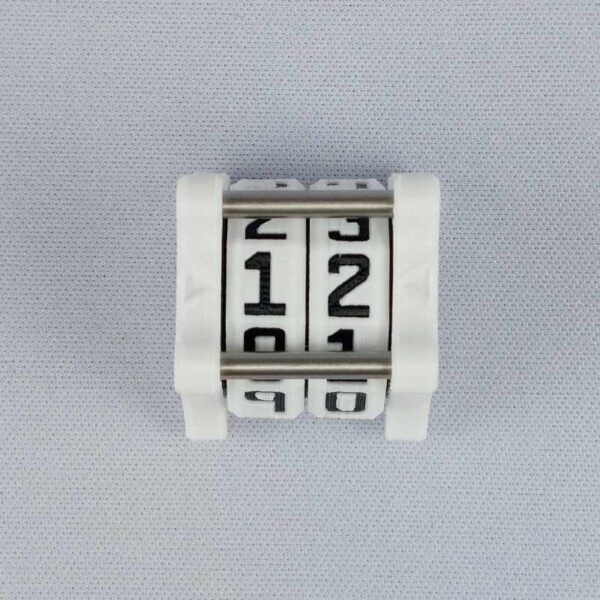 The NC-2 number counter viewed from the top to show the two dials. The version shown has a white base with a black castle outline in the middle on both sides 1 and 2.